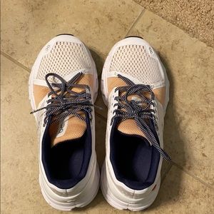 Women’s on cloud tennis shoes.